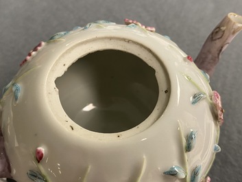 A pair of Chinese famille rose relief-decorated teapots with floral design, Yongzheng